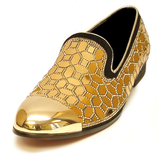 The FI-7024 Gold slip-on leather shoe from the Fiesso by Aurelio Garcia collection showcases intricate geometric patterns and metallic accents on the toe and heel, epitomizing elegance. It's an essential addition to any stylish wardrobe.