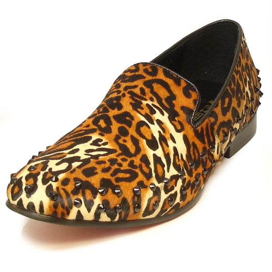 The FI-7037 Leopard Fiesso by Aurelio Garcia fashion shoe features a leather upper adorned with black studs along the edges and heel, and offers a cushioned insole for ultimate comfort.