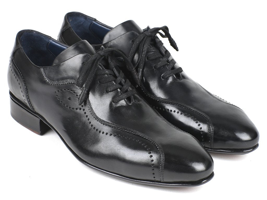 Paul Parkman presents the Handmade Lace-Up Casual Shoes in black, model 84654-BLK. These elegant shoes feature decorative perforations and are crafted from exquisite Italian calfskin, beautifully displayed on a white background.