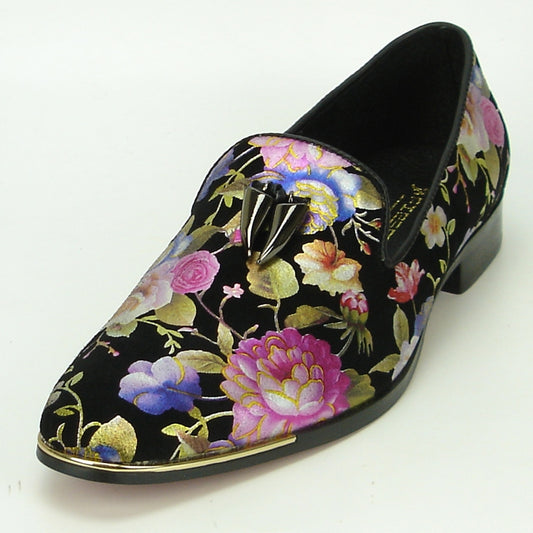 The FI-6921 Rose Fiesso by Aurelio Garcia loafer from the Fiesso brand features a black velvet finish, vibrant floral embroidery, metallic embellishment on top, and a cushioned insole for added comfort. This fashionable shoe elegantly merges style with practicality.