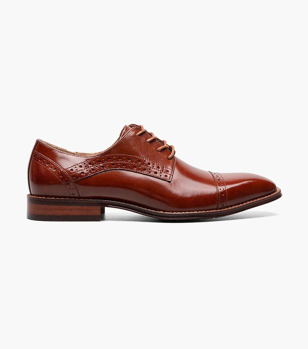 Introducing the Stacy Adams - GARRETT Cap Toe Oxford in Cognac (style number 25543-221) featuring brogue detailing, Buffalo leather upper, and classic laces, set against a white background.