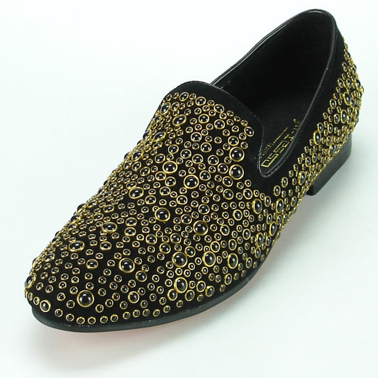 The FI-7082 Black Fiesso by Aurelio Garcia loafer from Fiesso is a stylish black fashion shoe featuring a leather upper embellished with an array of gold studs across the surface, ensuring style meets comfort with its cushioned insole.