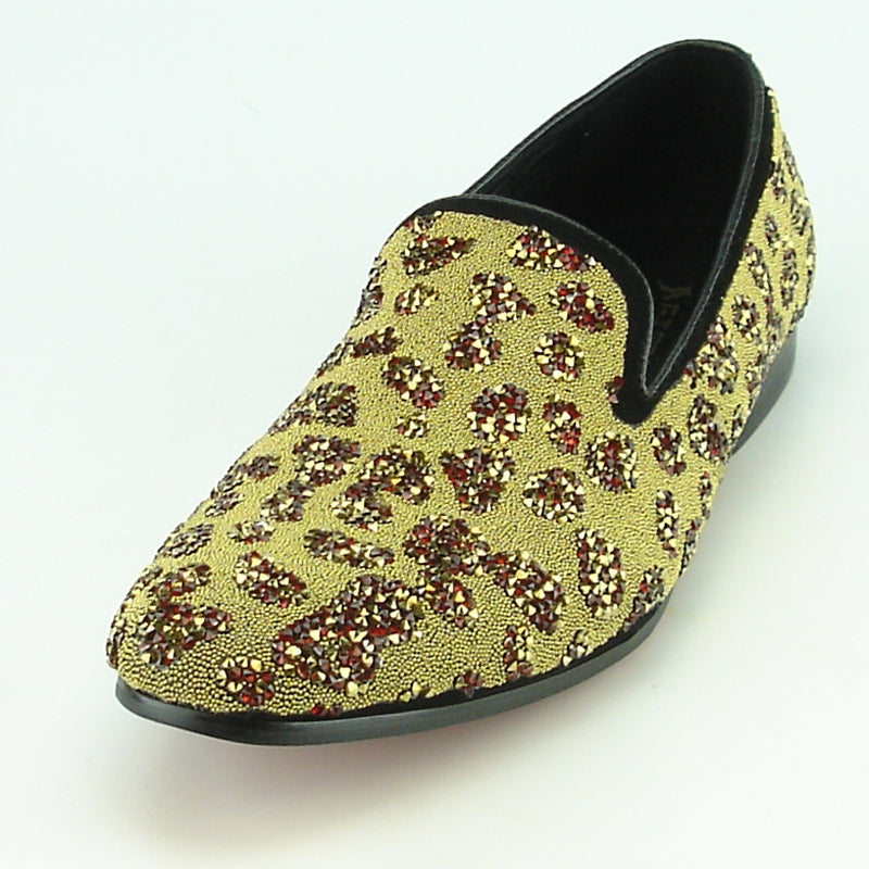 The FI-7097 Gold Fiesso slip-on shoe from Fiesso by Aurelio Garcia features a captivating gold and red leopard print set against a white background, complemented by an elegant leather upper, making it ideal for those looking to make a bold fashion statement.