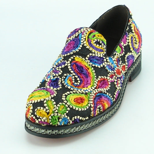 The FI-7118 Multi Color shoe by Fiesso, designed by Aurelio Garcia, is a vibrant embroidered leather piece that features a black background with striking swirl and floral patterns, making it a standout in fashion footwear.