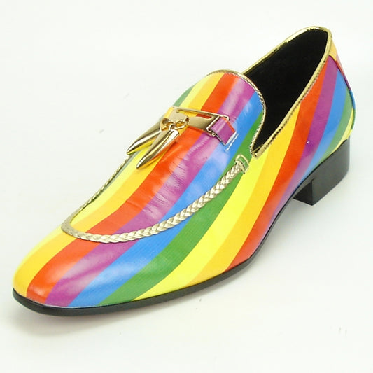 The FI-7157 Rainbow Slip-On by Fiesso, designed by Aurelio Garcia, is a vibrant loafer featuring a multicolored striped pattern and a decorative gold element on the top. This fashionable shoe has a leather upper for added luxury and is finished with a low black heel.