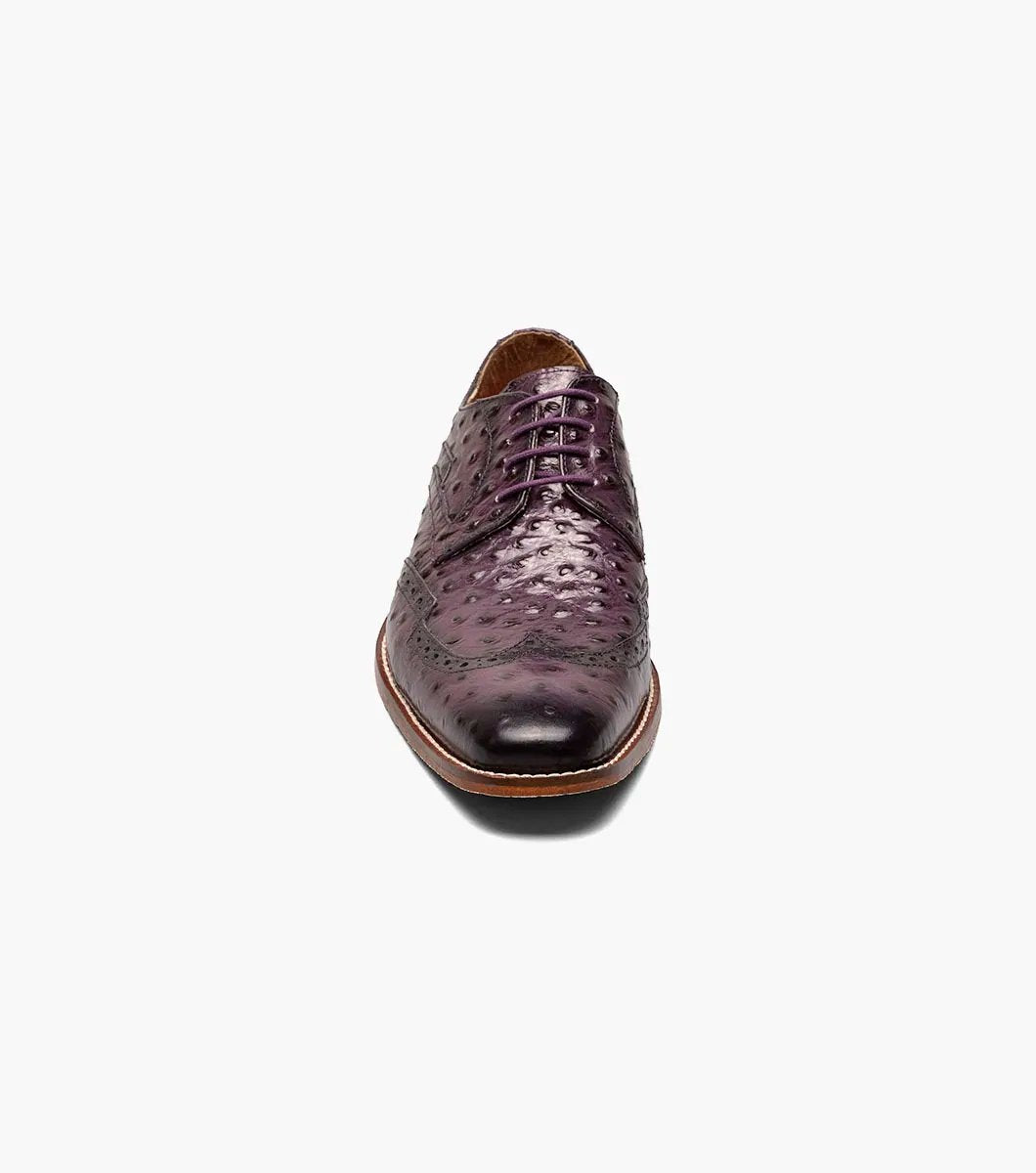 A plum Stacy Adams GENNARO Wingtip Oxford, skillfully crafted from genuine leather with an attractive ostrich quill print texture and featuring a low wooden heel.