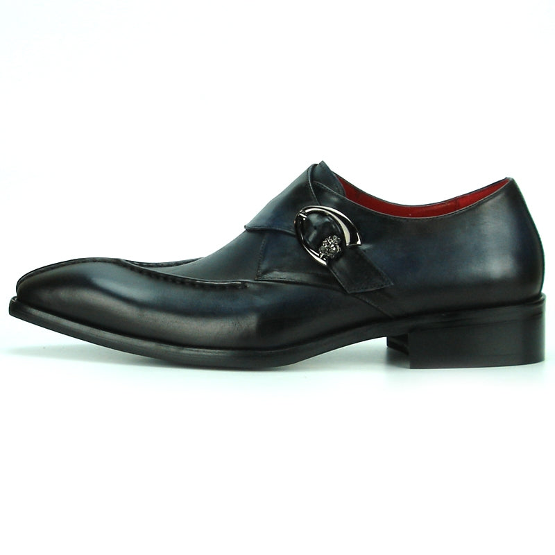 The FI-8712 Black Encore by Fiesso is a black leather fashion shoe featuring a pointed toe, a decorative buckle on the side, and a cushioned insole designed for all-day comfort.