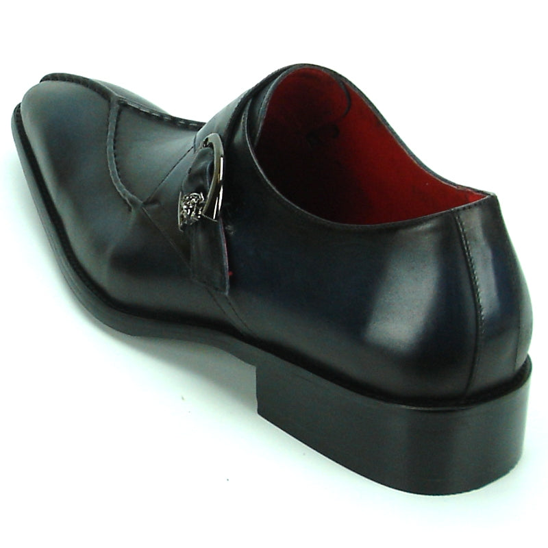 The FI-8712 Black Encore by Fiesso is a black leather fashion shoe featuring a pointed toe, a decorative buckle on the side, and a cushioned insole designed for all-day comfort.