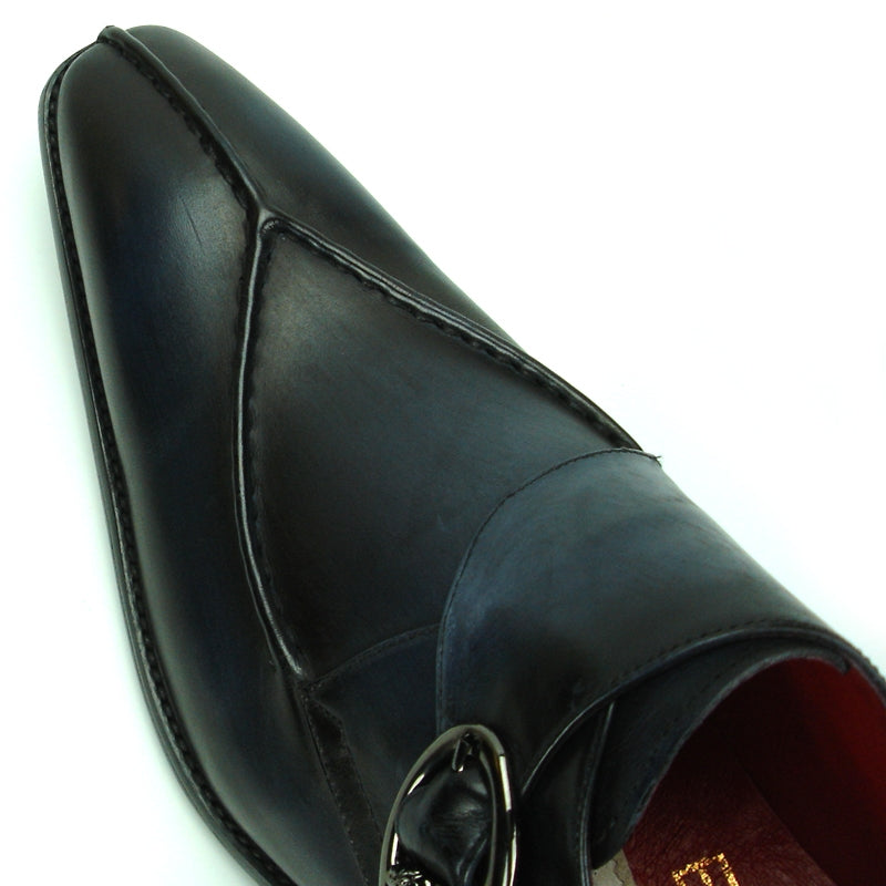 The FI-8712 Black Encore by Fiesso is a black leather fashion shoe featuring a pointed toe, a decorative buckle on the side, and a cushioned insole designed for all-day comfort.