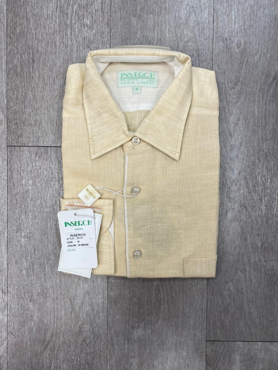 Inserch Premium Linen Yarn-Dye Solid Long Sleeve Shirt 24116-07 in beige, showcasing contrast trimming and tags, displayed on a wooden floor.