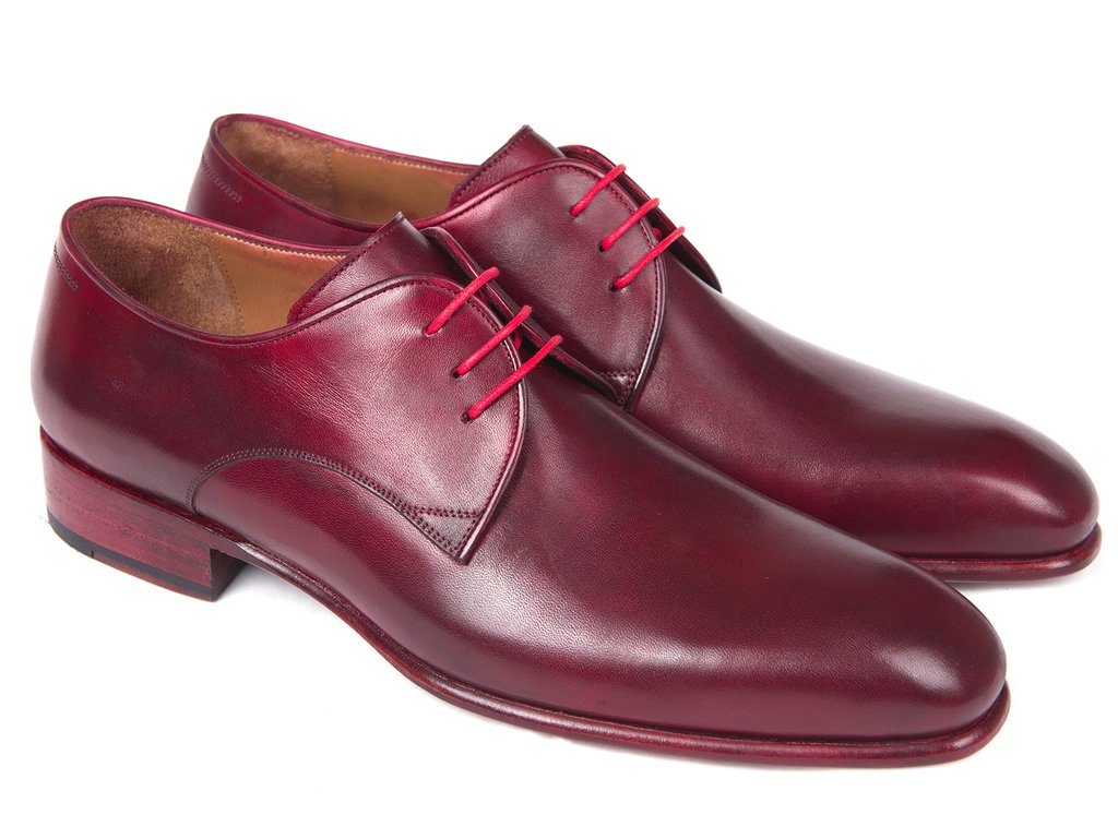 The Paul Parkman Burgundy Hand Painted Derby Shoes - 633BRD72 feature a polished burgundy leather finish with red laces, showcasing a classic derby design and low stacked heels. These made-to-order shoes from Paul Parkman are crafted with a luxurious calfskin upper and meticulous craftsmanship, ensuring both style and comfort with every step.