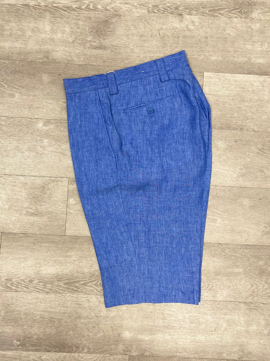 Inserch Premium Linen Flat Front Shorts in Blue Wave are displayed on a wooden floor, making them a perfect addition to your summer wardrobe.