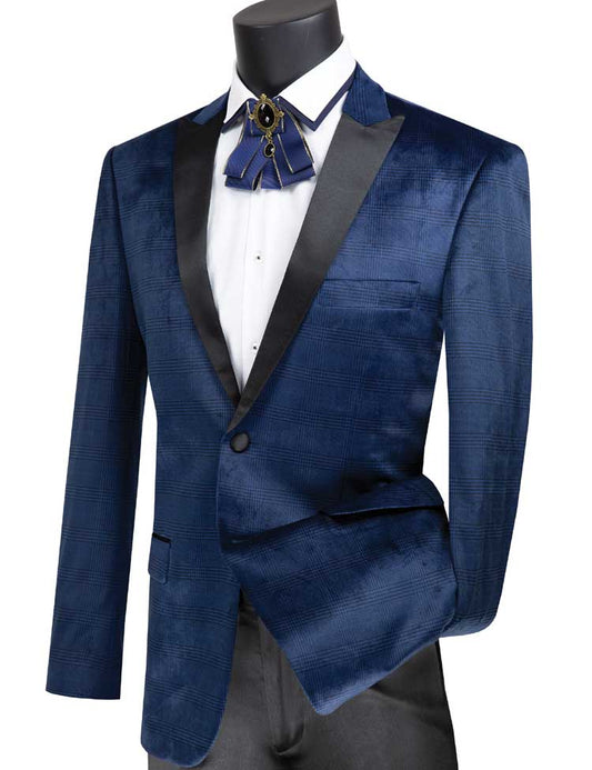 Displayed on a mannequin, the eye-catching Vinci Slim Fit 2 Button Peak Lapel Glen Plaid Pattern Velvet Jacket in Navy by Vinci Suits, paired with a crisp white shirt and matching blue bow tie, exudes elegant style.