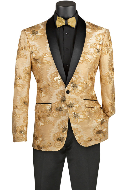 The mannequin is dressed in the Vinci Slim Fit Embroidered Shawl Lapel with Bow Tie Jacket (Champagne Beige) BSF-13 by Vinci Suits, featuring a gold floral pattern, shawl lapels complemented by black accents, and paired with a matching gold bow tie over a black shirt and pants.