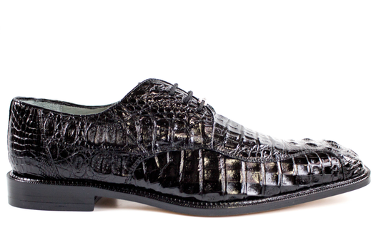 Introducing the Belvedere Chapo, a stunning men's dress shoe crafted from genuine Hornback Caiman leather. This black shoe by BELVEDERE features a crocodile-patterned design with laces, a low heel, and a polished finish. Hand-painted for an elegant touch, the Chapo offers sophistication and style.