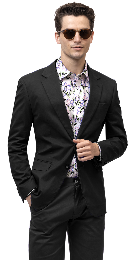 A man sporting an EJ Samuel Black Solid Chino Blazer CHJ01 over a floral shirt stands confidently, adjusting his sunglasses with one hand.