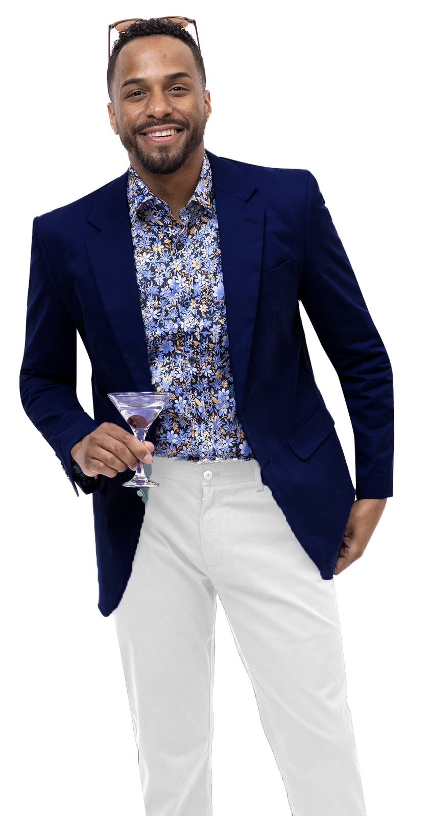 An individual dressed in the EJ Samuel Navy Solid Chino Blazer CHJ01 and a floral shirt stylishly pairs this look with chinos; he holds a martini glass while sunglasses rest on his head.