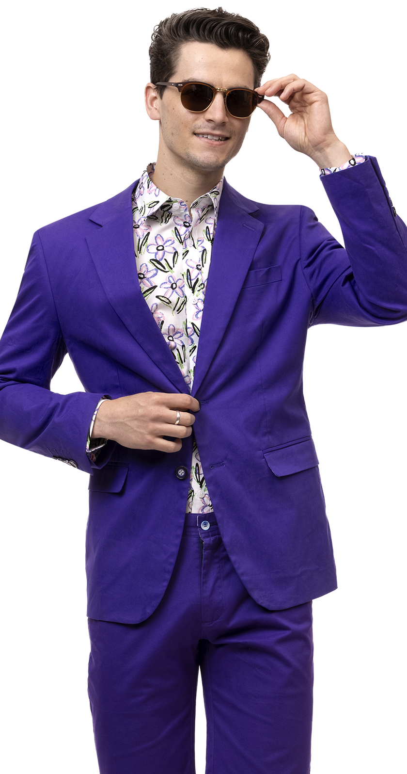 A person wearing the EJ Samuel Purple Solid Chino Blazer CHJ01, a floral shirt, and sunglasses holds the jacket with one hand while adjusting the sunglasses with the other.