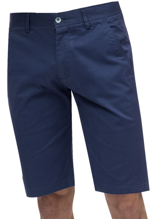 A person wearing the EJ Samuel Mid Night Chino Short Pants CHS01, featuring a stylish navy blue design with pockets and a button-front closure, perfect for those who appreciate fashionable men's attire.