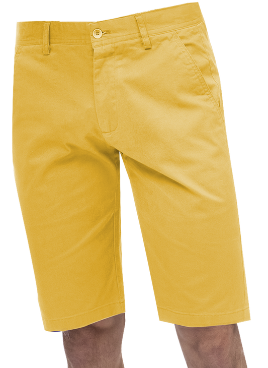 An individual confidently stands against a white backdrop wearing the EJ Samuel Yellow Chino Short Pants CHS01, featuring stylish side and back pockets.