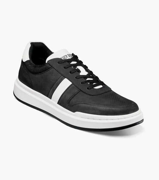 The Stacy Adams - CURRIER Moc Toe Lace Up Sneaker in black is designed with a suede upper, highlighted by two white stripes on the side, and finished with a thick cushioned sole for comfort.