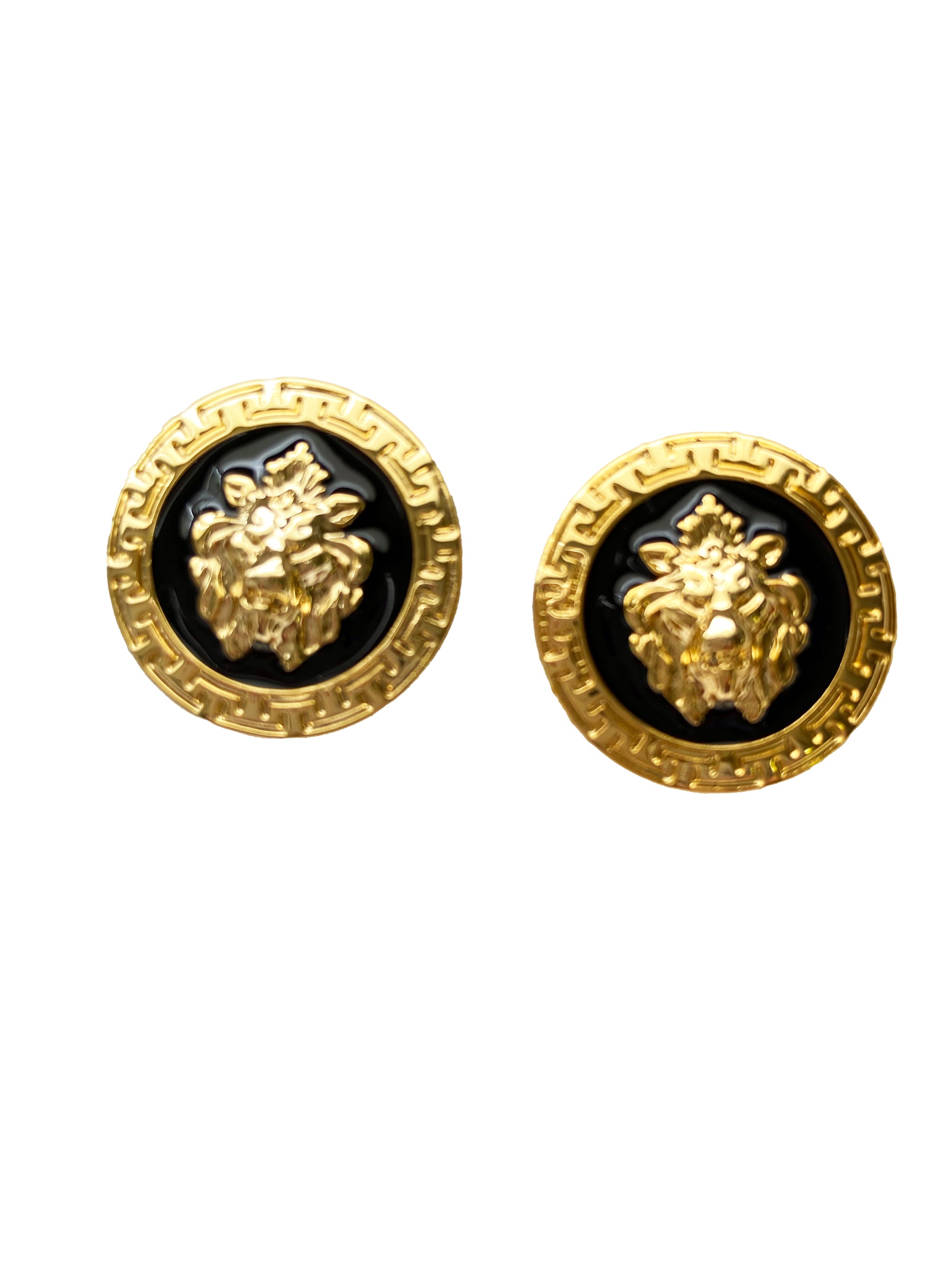 Emilio Franco Couture presents these elegant gold and black circular cufflinks, featuring a distinguished raised lion's head design.