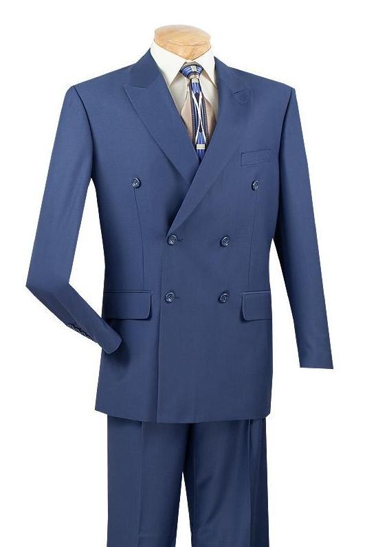 The Vinci Regular Fit Double Breasted 2 Piece Suit (Blue) DC900-1 from Vinci Suits is showcased on a mannequin, accompanied by matching trousers, a patterned tie, and a light-colored shirt.