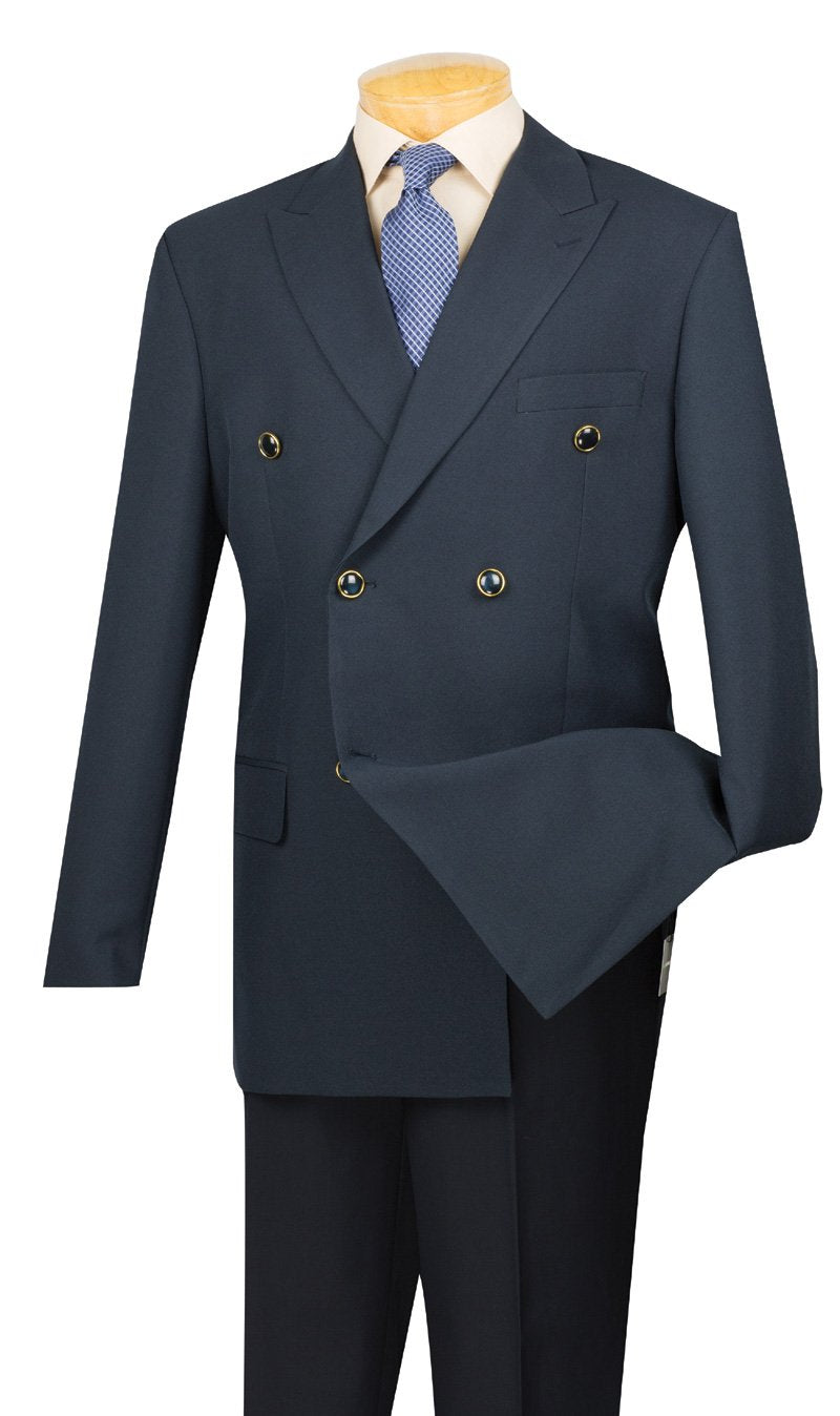 The Vinci Regular Fit Double Breasted 2 Piece Suit (Navy) DPP from Vinci Suits is displayed on a mannequin, paired with a crisp white shirt and a matching blue tie.