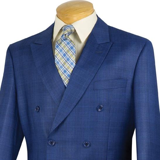 The Vinci Regular Fit Double Breasted Glen Plaid 2 Piece Suit in blue, featuring a wrinkle-resistant design, is displayed on a mannequin with a light shirt and a blue patterned tie.