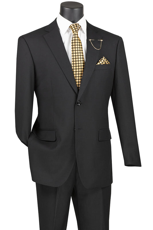 Displayed on a mannequin is the Vinci Executive 2 Piece Suit by Vinci Suits, featuring a notch lapel and single-breasted design in black. The ensemble includes a white shirt, checkered tie, and pocket square for added elegance. Experience the sophisticated wool feel that completes this stylish look.