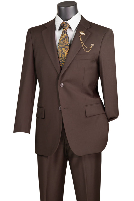 Displayed on a mannequin, the Vinci Executive 2 Piece Suit with a 2″ adjustable waistband in brown from Vinci Suits exudes luxury with its wool-like feel. It's complemented by a striped shirt and paisley tie, accessorized with a gold chain and lapel brooch for the perfect blend of comfort and style.