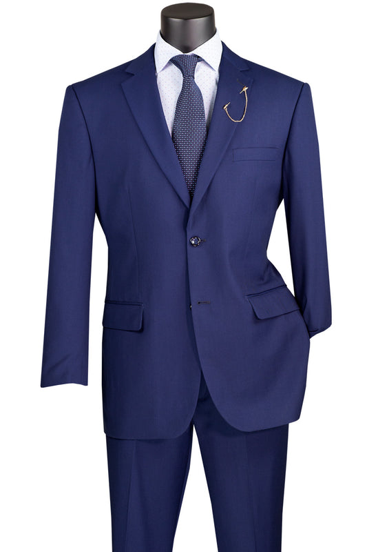 A mannequin displays the Vinci Executive 2 Piece Suit in Patriot Blue, accented by a crisp white shirt and a dark tie. The notch lapel is embellished with a striking fish hook, enhancing the luxurious wool texture of this Vinci Suits creation.