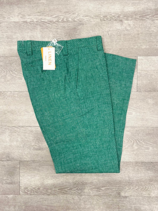 The Inserch Premium Linen Flat Front Pants P3116 in green, featuring a traditional silhouette, are laid flat on a wooden floor with their price tag attached, making them the perfect addition to any warm weather ensemble.