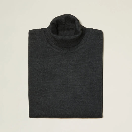 The Inserch Cotton Blend Turtleneck Sweater in Charcoal 4708, made from a soft cotton blend, is folded on a light background and viewed from above, making it perfect for fall fashion.