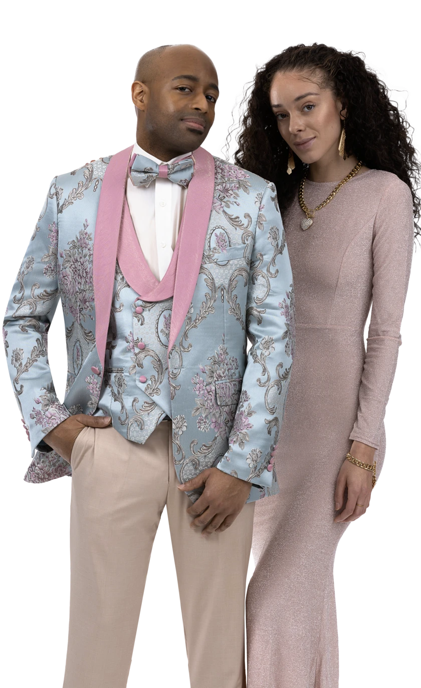 A man wearing an EJ Samuel Gray/Pink Blazer J128, exclusive to stores and available only in size 38R, stands beside a woman in a pink long dress. Both are posing for a photo.