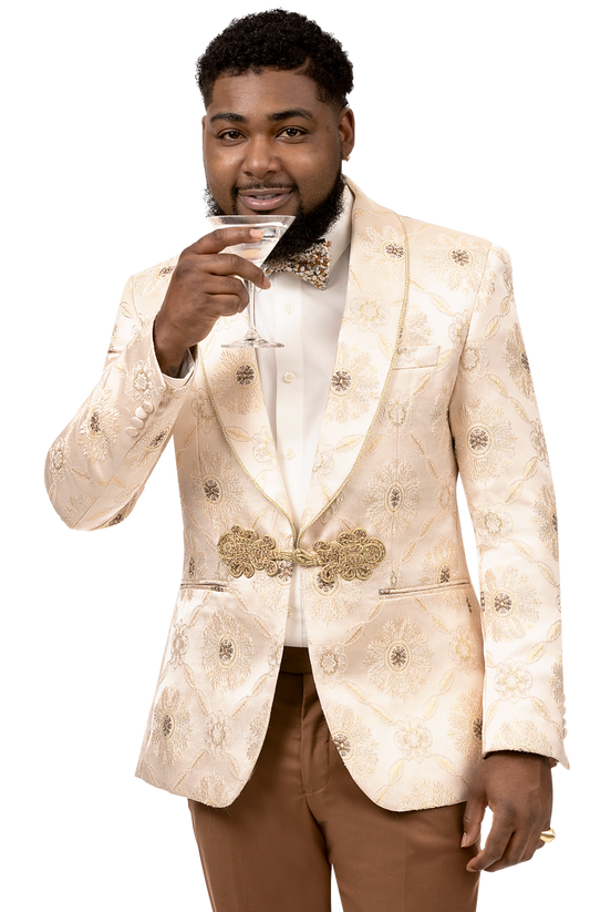 A man in an EJ Samuel Cream Blazer J166 paired with a matching bow tie holds a cocktail glass, smiling at the camera.