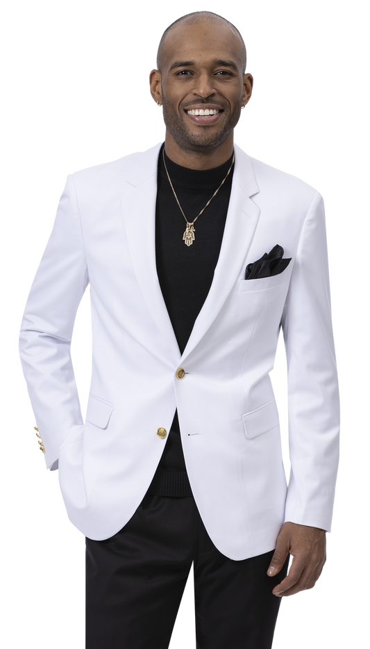 A person smiling, wearing the EJ Samuel White Blazer J170 by EJ SAMUEL, featuring striking gold buttons over a black shirt, complemented by a gold necklace and a pocket square for that touch of elegance.