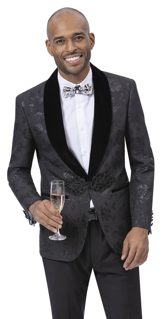 A man in an EJ Samuel Black Blazer J175 paired with a stylish bow tie holds a glass of champagne, smiling confidently at the camera.