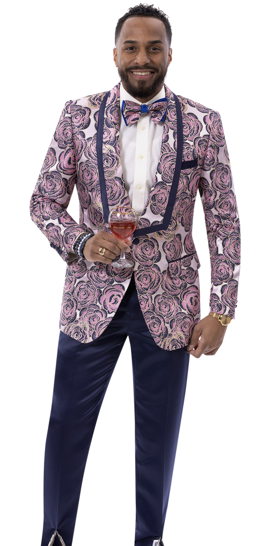 A man clad in the EJ Samuel Navy/Pink Blazer J186 from EJ SAMUEL, complemented by a matching bow tie, holds a glass of red wine while standing elegantly against a white background.