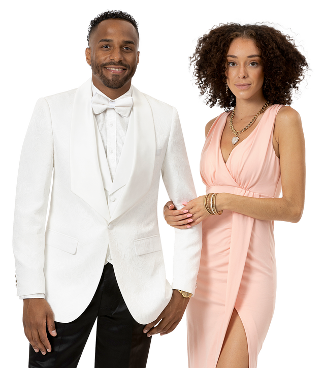 A man wearing an EJ SAMUEL White/White Blazer J64, featuring a sleek modern fit and satin lapel, stands beside a woman in a pink dress, both smiling.