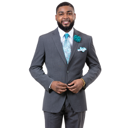 A man wearing the EJ Samuel Light Gray Ultra Slim Fit Suit M18018, complemented by a teal tie and floral boutonniere, smiles at the camera, highlighting the elegance of its notch lapel design.