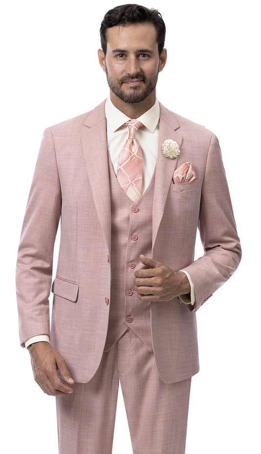 A man is dressed in an EJ Samuel Mauve Modern Fit Suit M18022, complemented by a patterned tie and pocket square.