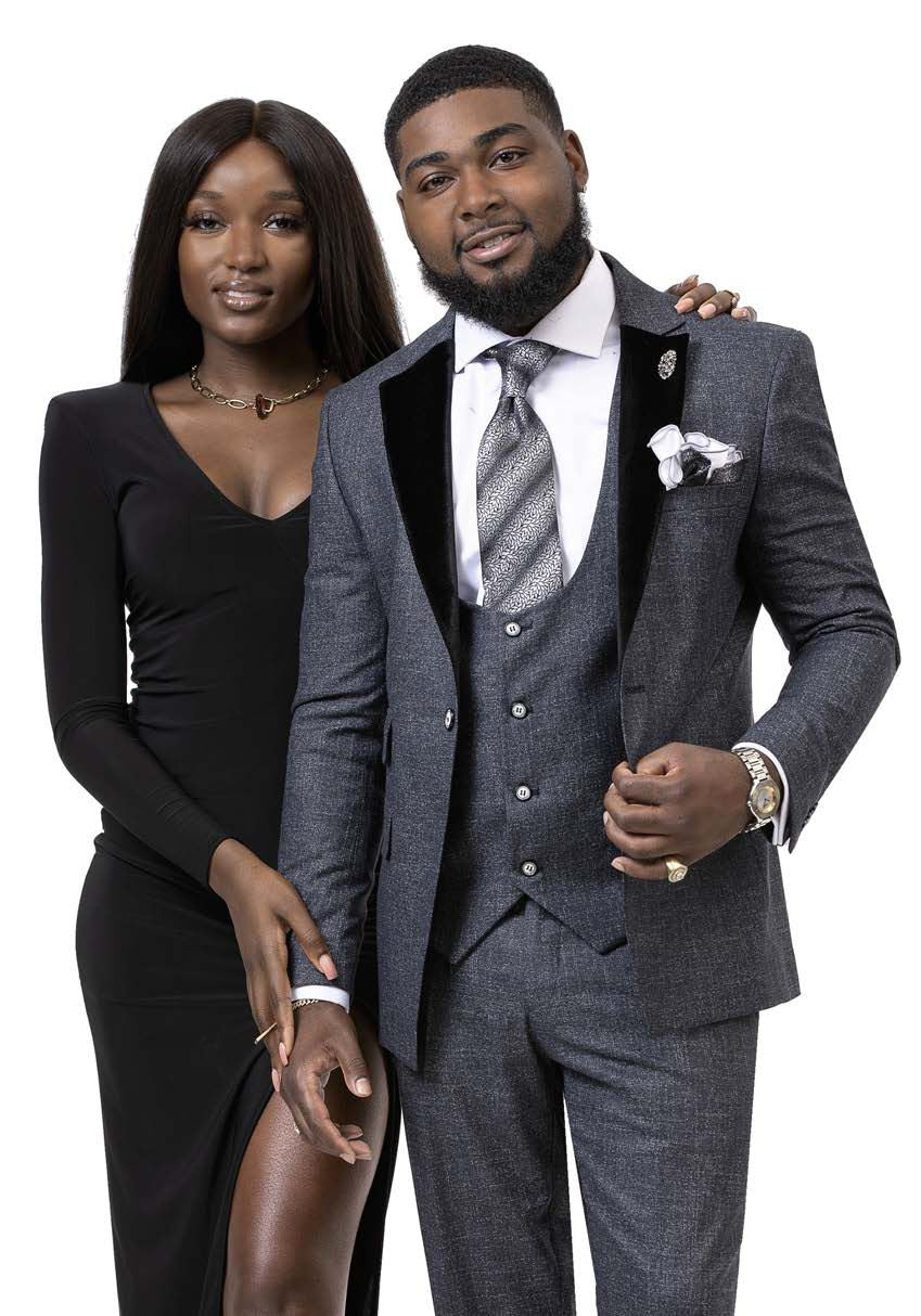 A man in an EJ Samuel Blue Slim Fit Suit M2751 stands alongside a woman in a black dress, both against a white background.