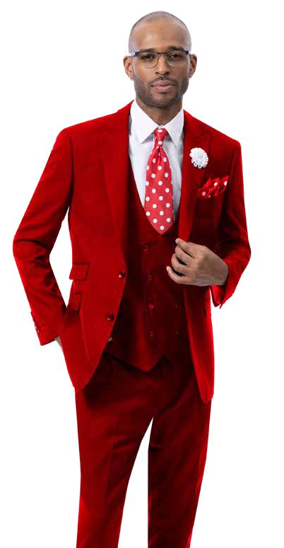 A man wearing the EJ Samuel Red Suit M2770, complemented by a crisp white shirt and a polka dot tie, exudes confidence, showcasing his elegant ensemble from EJ SAMUEL.