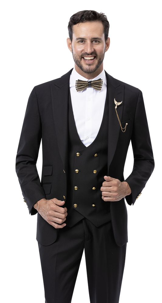 A man in an EJ Samuel Black Suit M2771 from the EJ SAMUEL brand, styled with a bow tie and gold brooch, resting his hand on the jacket adorned with elegant gold buttons.