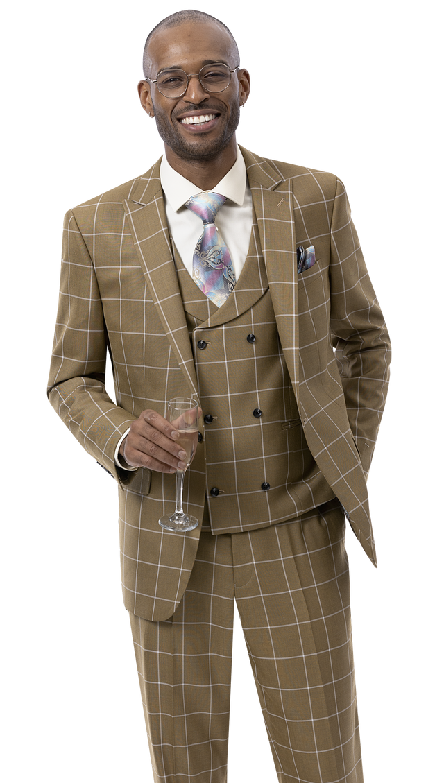 A person in an EJ Samuel Mustard Suit M2774, paired with a vibrant tie and vest, stands smiling while holding a champagne glass.