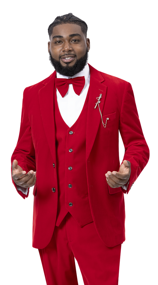 A man in an EJ Samuel Red Suit M2781, featuring a stylish 3-piece design with a matching vest and red bow tie, stands with a neutral expression, his hands slightly raised.