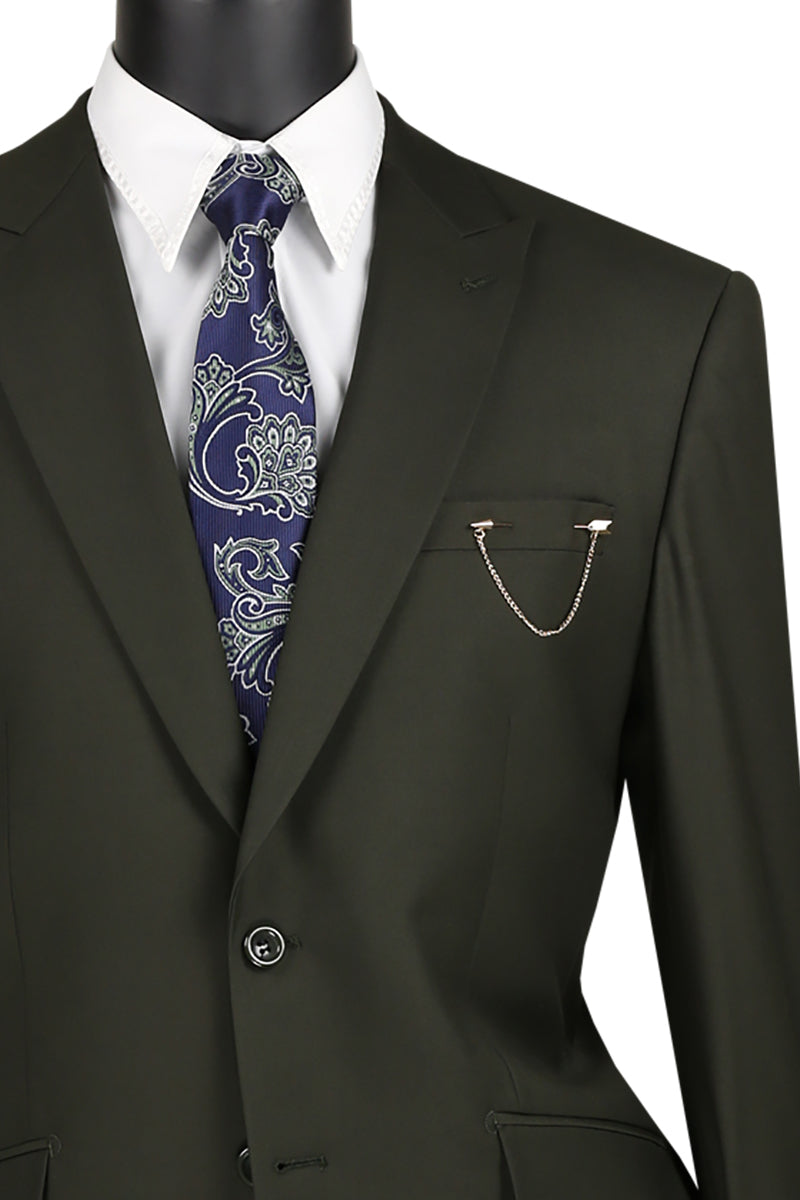 A mannequin showcases the Vinci Modern Fit Suit with Peak Lapel in Olive by Vinci Suits, featuring sleek side vents and paired elegantly with a white shirt and a blue paisley tie, exuding a modern fit.