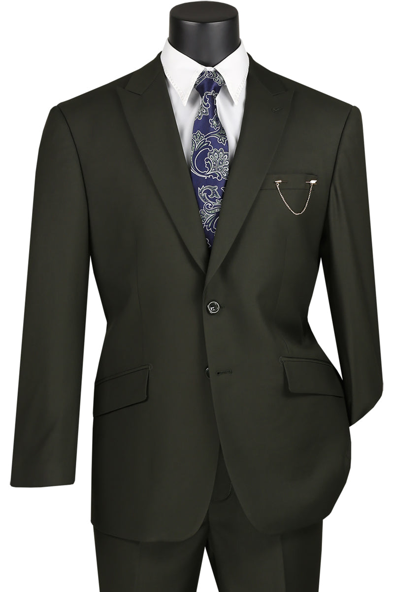 A mannequin showcases the Vinci Modern Fit Suit with Peak Lapel in Olive by Vinci Suits, featuring sleek side vents and paired elegantly with a white shirt and a blue paisley tie, exuding a modern fit.