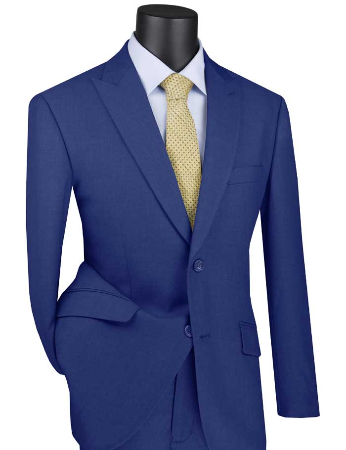 The Vinci Modern Fit Suit with a peak lapel in blue from Vinci Suits is elegantly draped over the mannequin, complemented by a light blue shirt and a striking yellow tie.